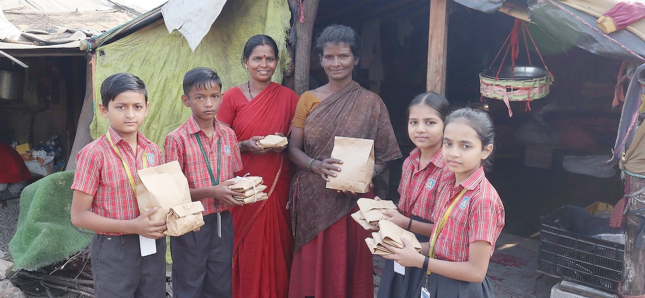 Voluntary food distribution by Adani Vidya Mandir, Ahmedabad (AVMA) students
